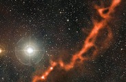 Newborn Stars Emerge from Dark Clouds in Taurus