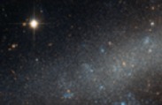 Dwarf Galaxy With a Bright Nebula