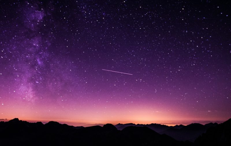 Shooting Star During Nighttime With Purple Sky