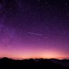 Shooting Star During Nighttime With Purple Sky